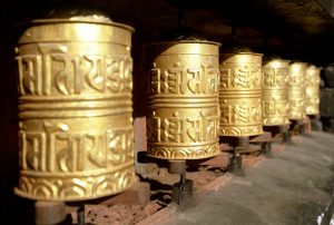 golden buddhist prayer wheels